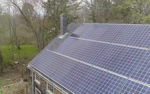 Rooftop solar panels on a barn in Maine