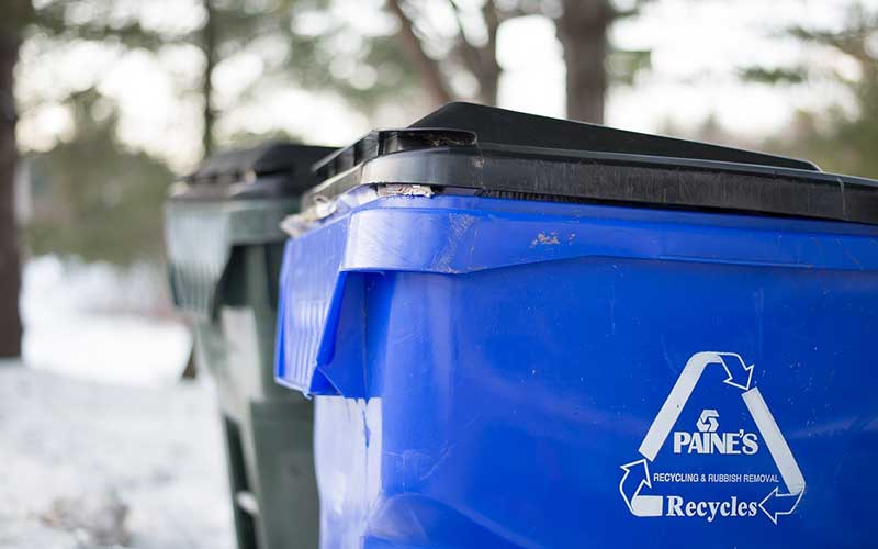 blue curbside recycling bin