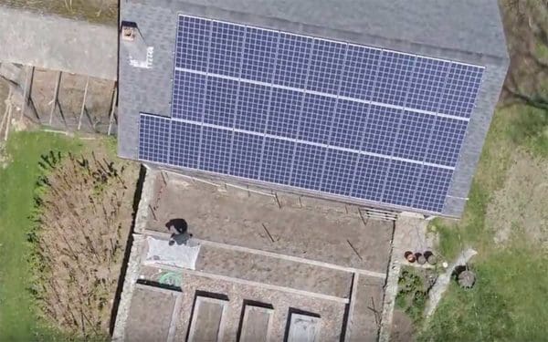 rooftop solar panels on a barn in Maine