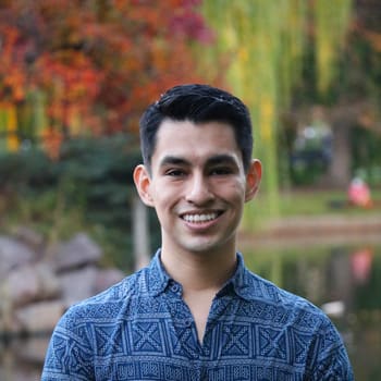 Adilson Gonzalez headshot in front of the Boston Common.