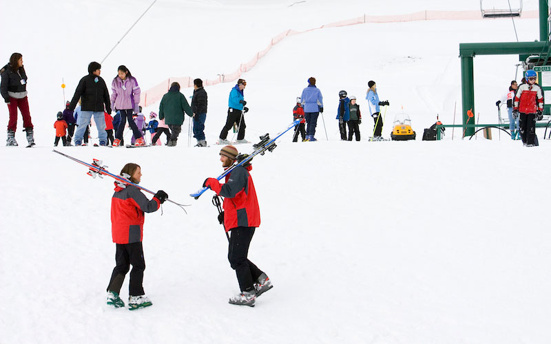 Skiers at a downhill ski area