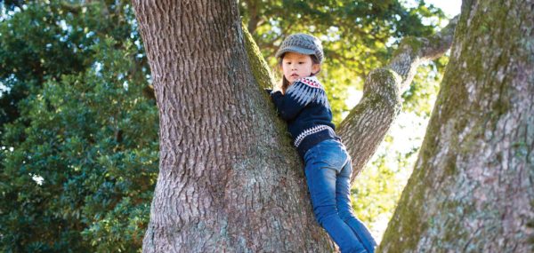 Girl Climbing Tree
