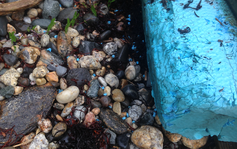 Small and large pieces of dock foam pollution