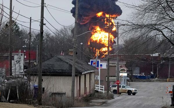 A black plume and fireball rise over East Palestine, Ohio, as a result of a controlled detonation of a portion of the derailed Norfolk Southern trains Monday, Feb. 6, 2023