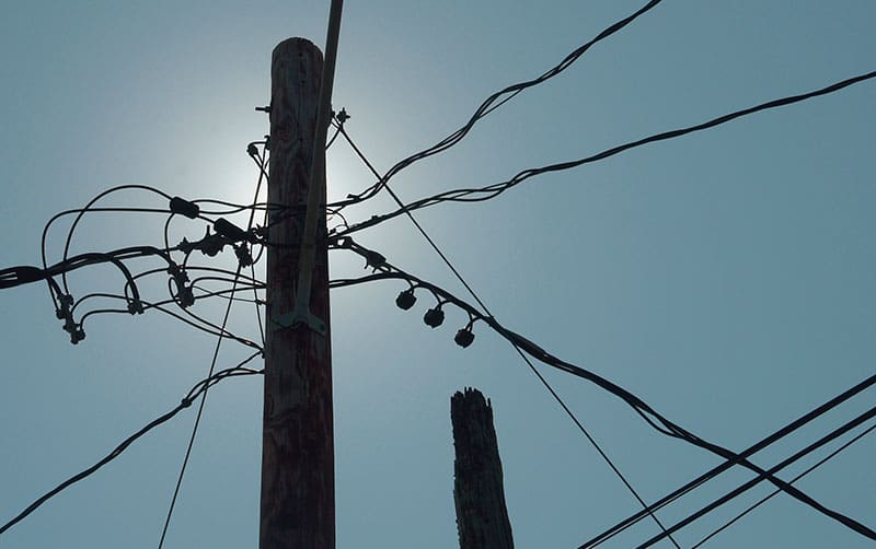 Power Lines radiate out from a utility pole