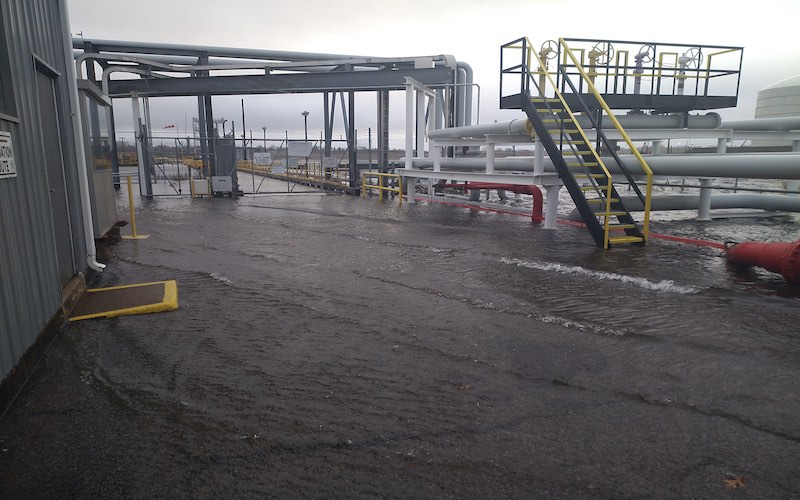Photos turned over by Shell show its facility flooding during a December 2022 storm.