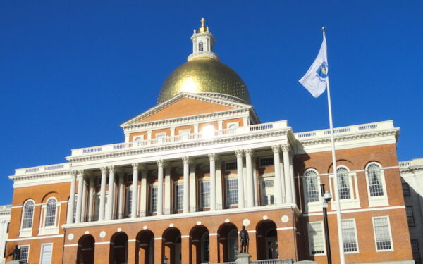 A shot of the Massachusetts state house, from the bottom angled upwards.