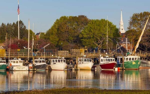 Colorful row of fishing boats at a dock