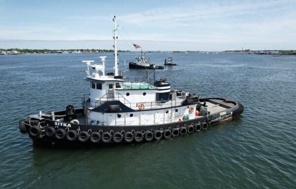 A tugboat named SITKA on the water